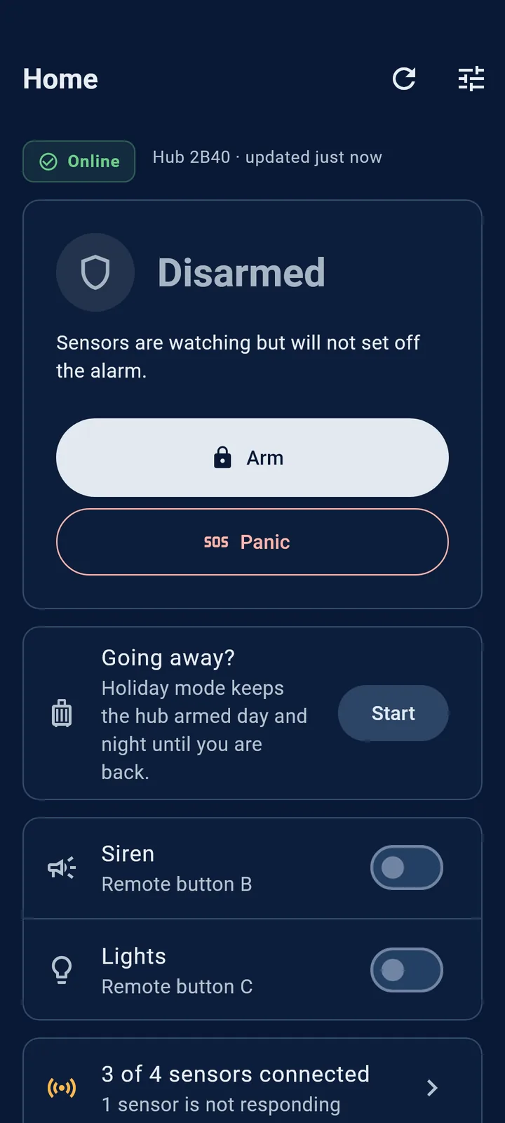 The Home screen: the hub disarmed, with Arm and Panic buttons, holiday mode and the siren and light switches